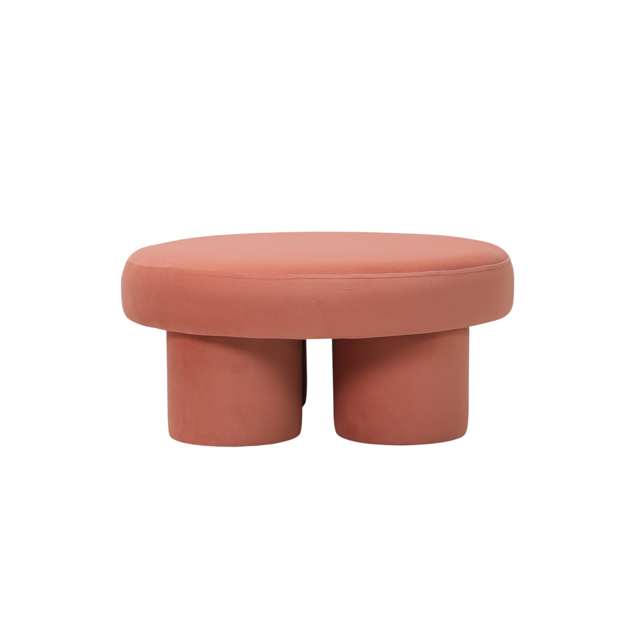 Pouf rotondo basso design moderno in velluto color terracotta con gambe cilindriche, linee morbide, a noleggio per eventi