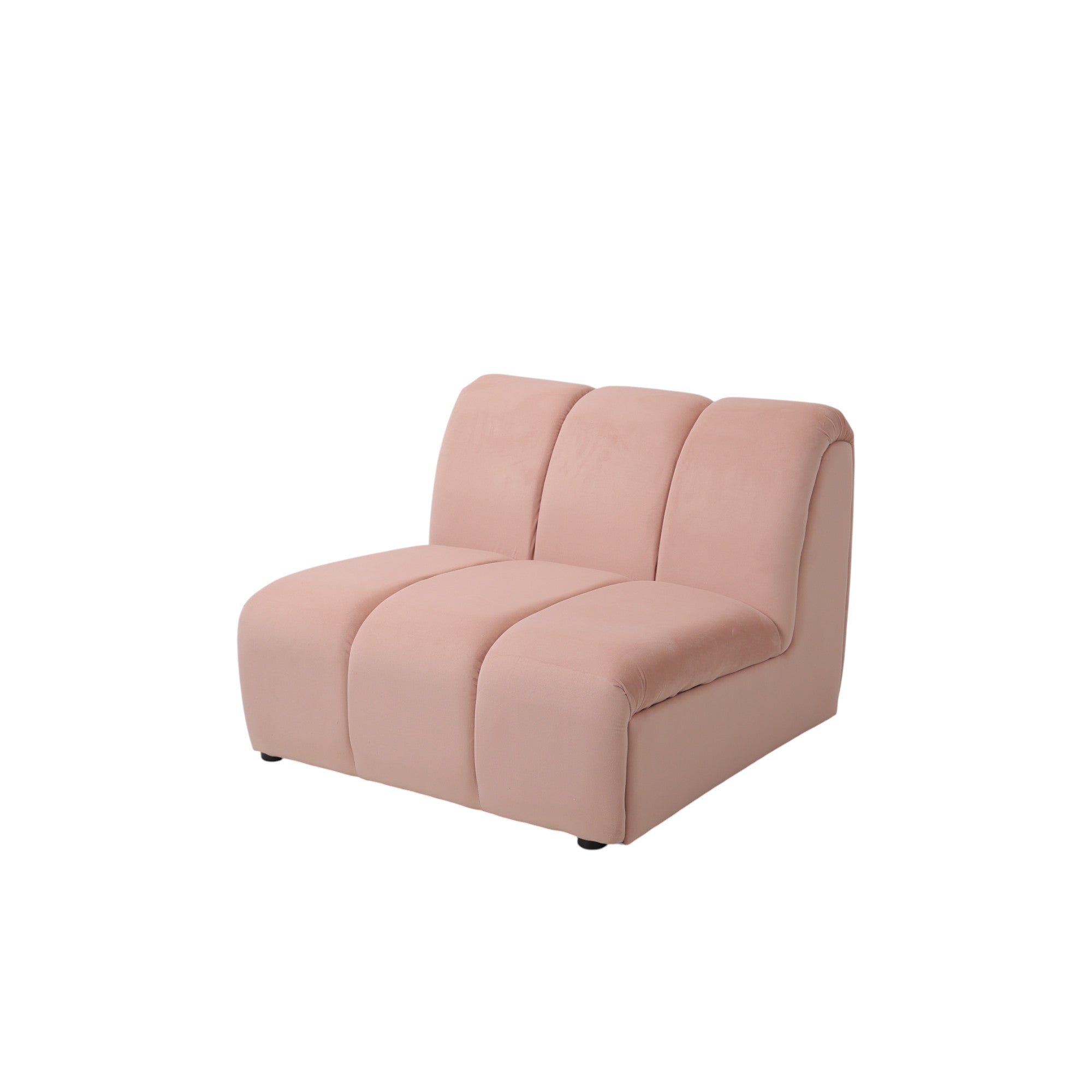 Divano modulare in velluto rosa cipria dalle linee arrotondate, con forma avvolgente e compatta, a noleggio nel Lazio.
