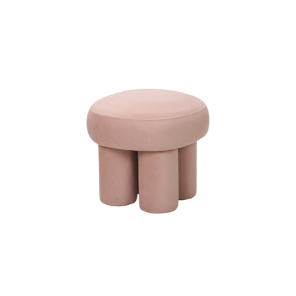 Pouf rotondo design moderno in velluto rosa cipria con gambe cilindriche, linee morbide, a noleggio a Roma.
