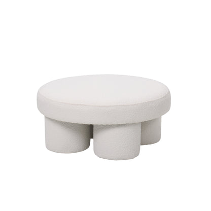 Pouf rotondo basso design moderno in velluto bianco con gambe cilindriche, linee morbide, a noleggio a Roma.
